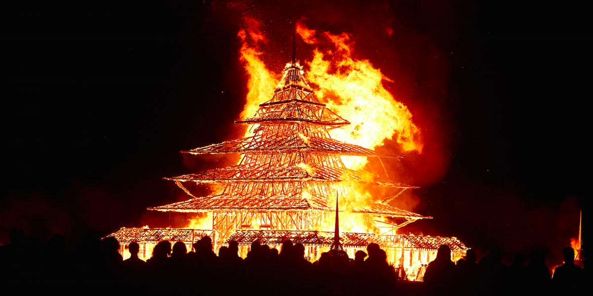 Burning Man Temple on fire at night