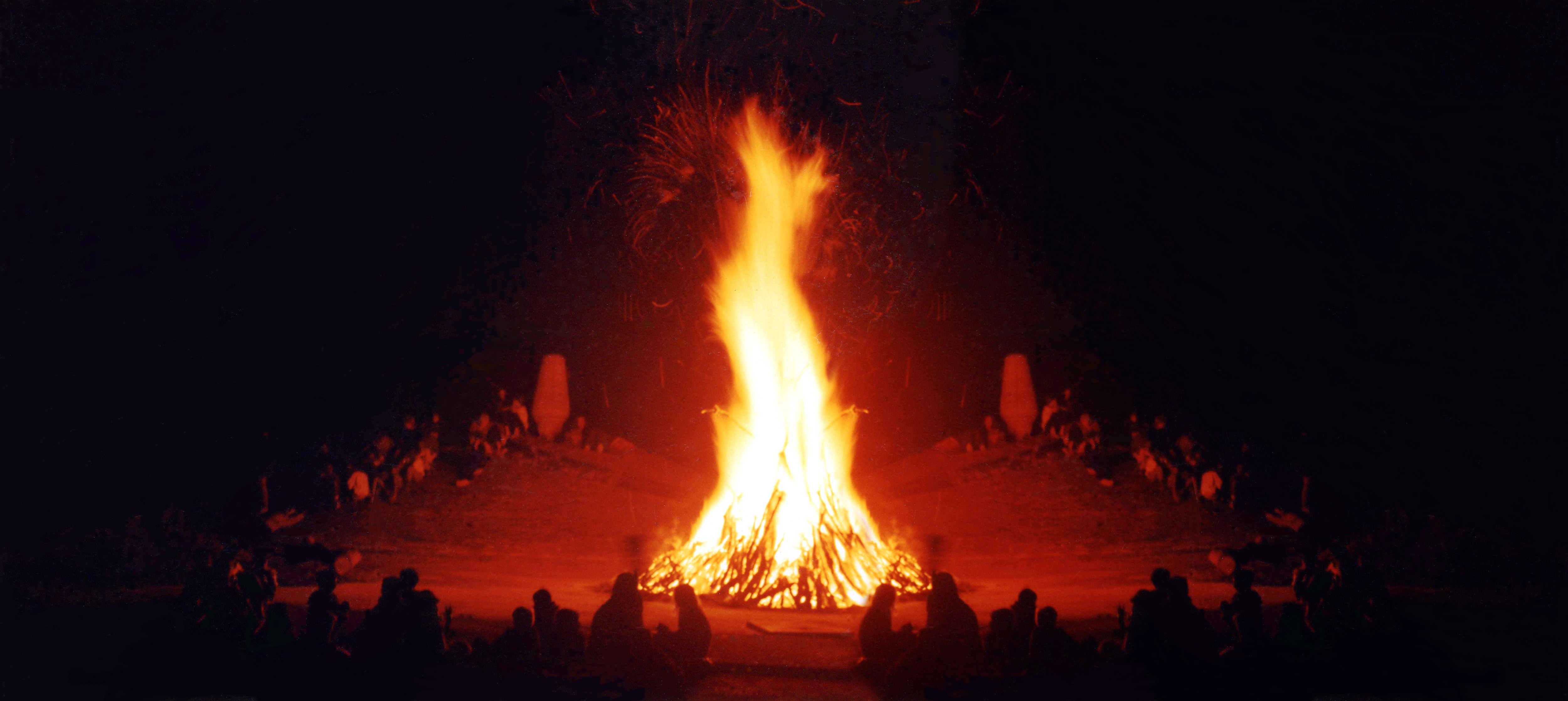 People gathered around a campfire